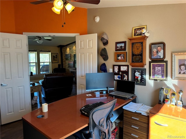 office space with ceiling fan and dark hardwood / wood-style floors