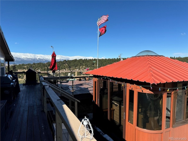 view of dock with a mountain view