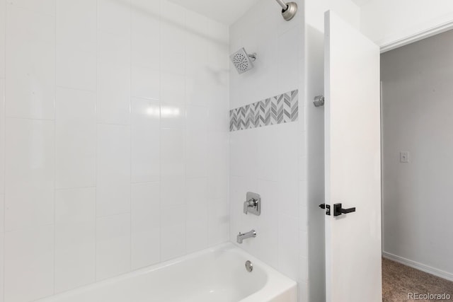 bathroom with shower / bathtub combination