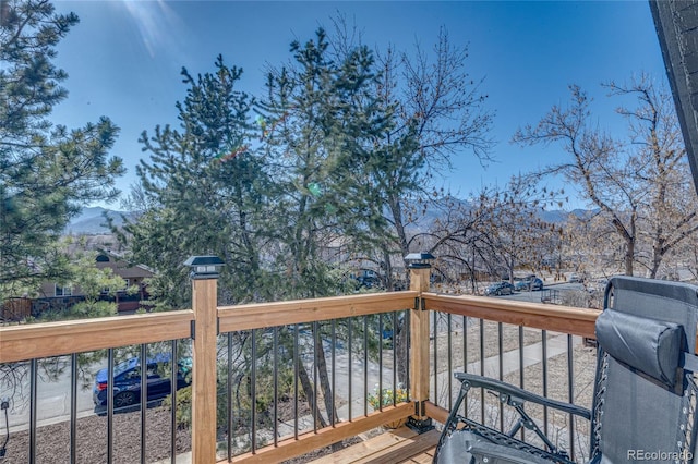 wooden terrace with a mountain view