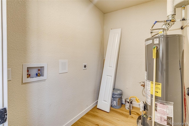 utility room with water heater