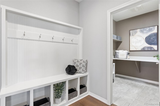 mudroom with visible vents and baseboards