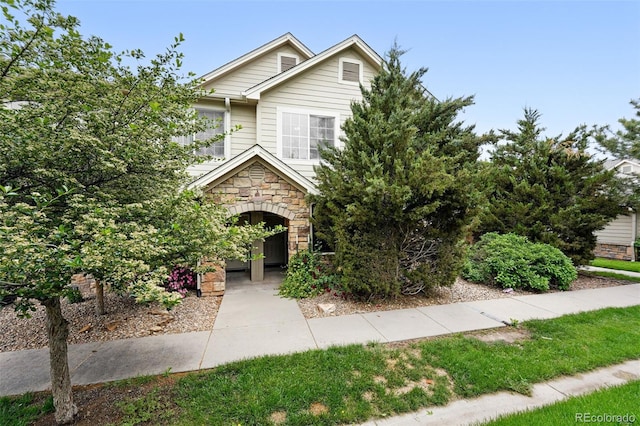10010 E Gunnison Pl Unit 707, Aurora, CO 80247 - obstructed view of property featuring stone siding