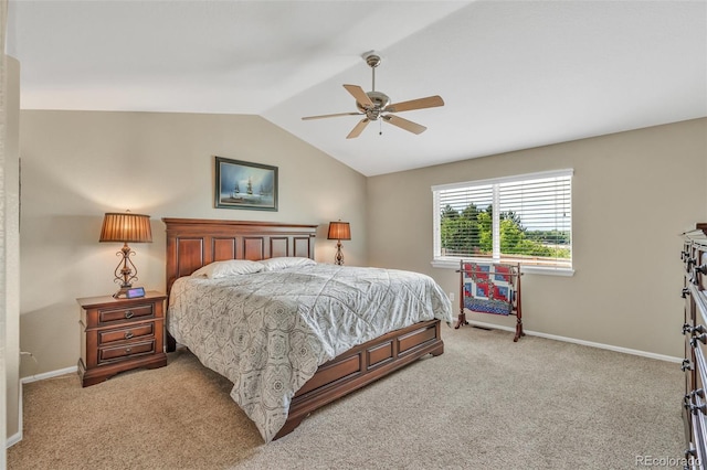 10877 W 55th Ln, Arvada, CO 80002 - bedroom featuring light carpet, lofted ceiling, baseboards, and a ceiling fan
