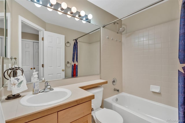10877 W 55th Ln, Arvada, CO 80002 - full bath with vanity, shower / bath combo with shower curtain, and toilet