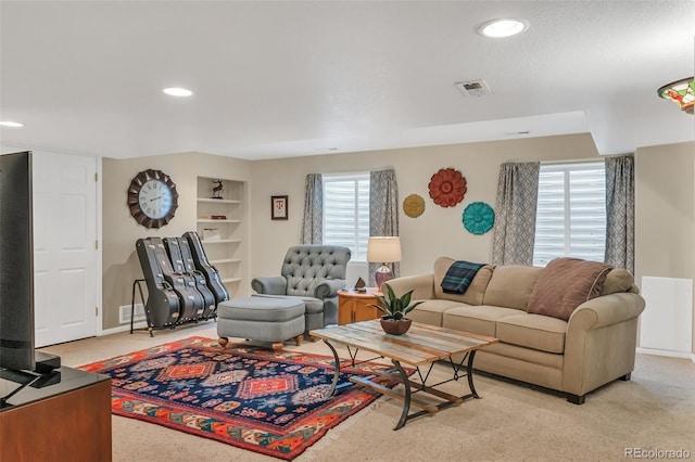 10877 W 55th Ln, Arvada, CO 80002 - living room with built in features, recessed lighting, and light colored carpet