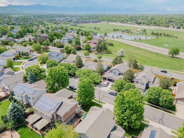 10877 W 55th Ln, Arvada, CO 80002 - aerial perspective of suburban area with a water and mountain view