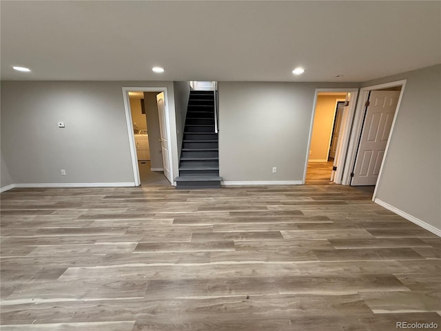 8307 E 14th Ave, Denver, CO 80220 - finished below grade area featuring baseboards, recessed lighting, wood finished floors, and stairs