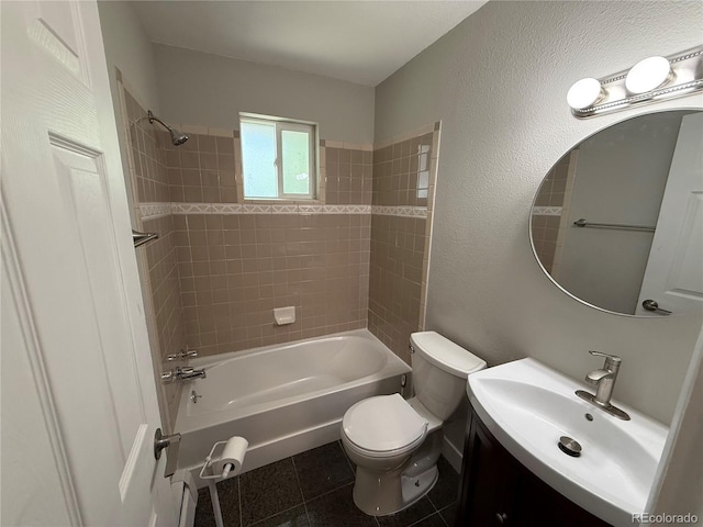 8307 E 14th Ave, Denver, CO 80220 - full bathroom with vanity, toilet,  shower combination, tile patterned flooring, and a textured wall