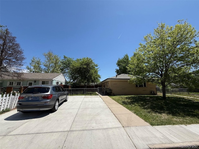 8307 E 14th Ave, Denver, CO 80220 - view of home's exterior with concrete driveway