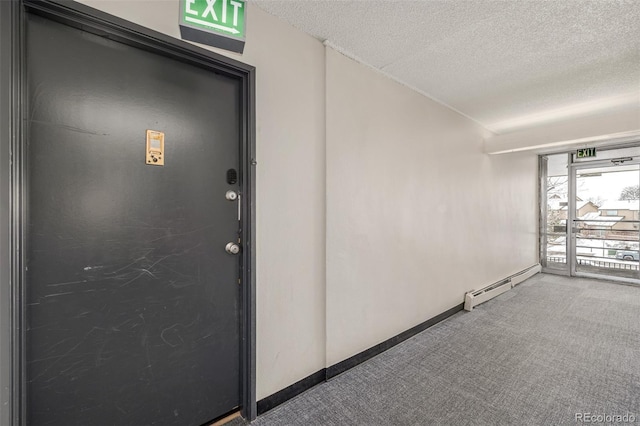 entrance to property featuring a baseboard radiator