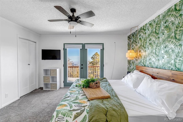 carpeted bedroom with ceiling fan, french doors, a textured ceiling, and access to exterior