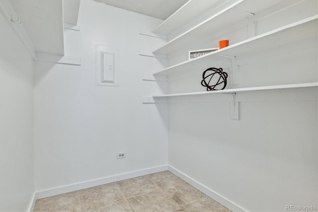 spacious closet with electric panel