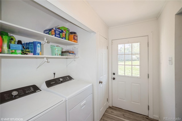 2080 E 84th Ave, Denver, CO 80229 - laundry room with washing machine and dryer and light wood-type flooring