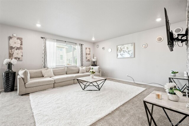 3074 Kestrel St, Brighton, CO 80601 - living room featuring light carpet and recessed lighting