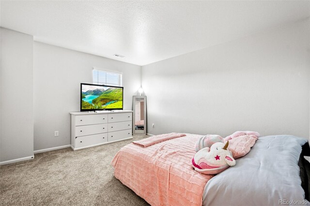 3074 Kestrel St, Brighton, CO 80601 - bedroom with light carpet and baseboards