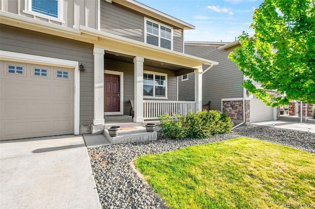 3074 Kestrel St, Brighton, CO 80601 - view of front of property featuring covered porch, a garage, driveway, and a front yard