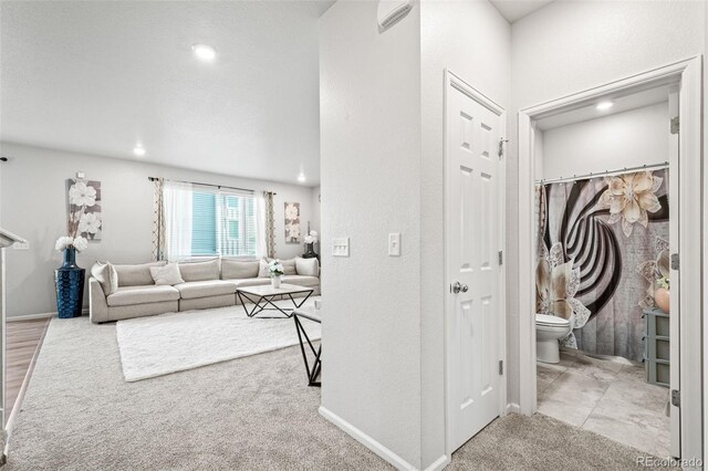 3074 Kestrel St, Brighton, CO 80601 - corridor featuring carpet floors and recessed lighting