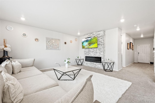 3074 Kestrel St, Brighton, CO 80601 - living room with light carpet, a large fireplace, and recessed lighting