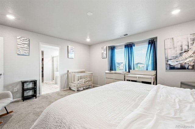 3074 Kestrel St, Brighton, CO 80601 - bedroom with carpet flooring, recessed lighting, and connected bathroom