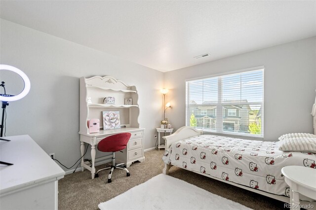 3074 Kestrel St, Brighton, CO 80601 - bedroom with light colored carpet and baseboards