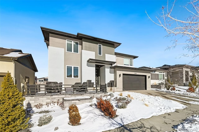 view of front of property featuring a garage