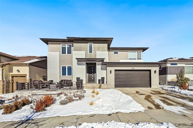 view of front of property with a garage