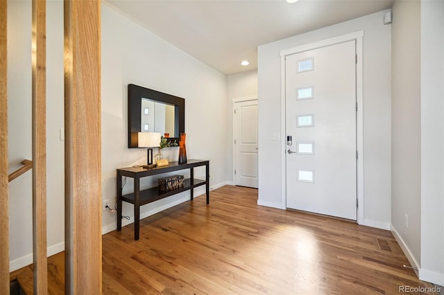 entryway featuring hardwood / wood-style flooring