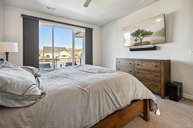 carpeted bedroom featuring ceiling fan and access to exterior