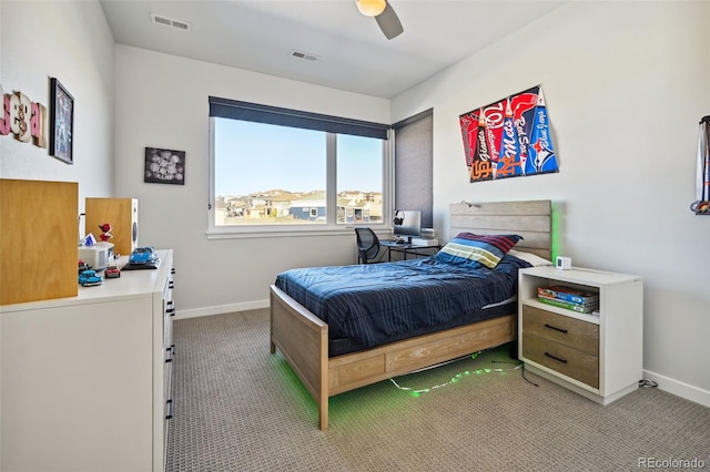 carpeted bedroom with ceiling fan