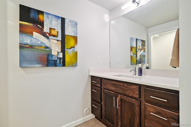 bathroom featuring tile patterned floors and vanity