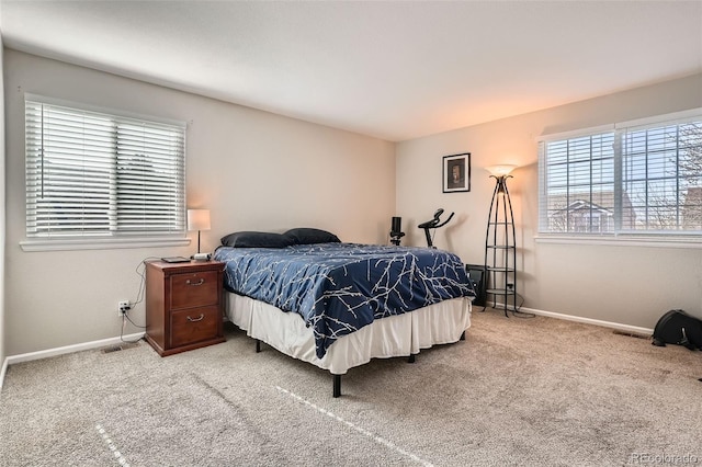 9615 Lansing Cir, Commerce City, CO 80022 - carpeted bedroom with baseboards