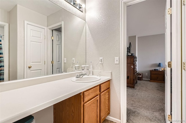 9615 Lansing Cir, Commerce City, CO 80022 - full bath with a textured wall and vanity