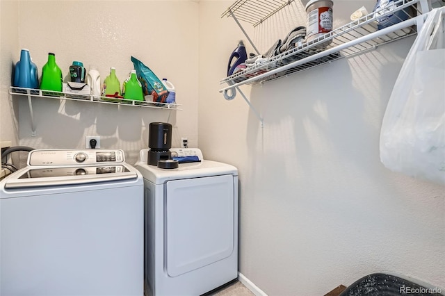 9615 Lansing Cir, Commerce City, CO 80022 - washroom featuring independent washer and dryer and laundry area