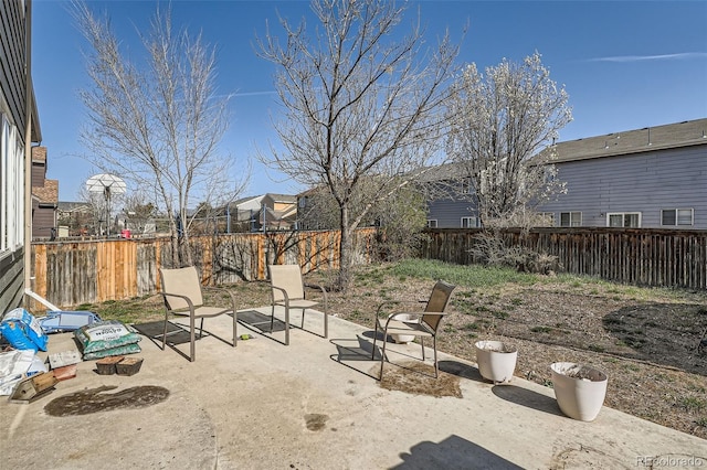 9615 Lansing Cir, Commerce City, CO 80022 - view of patio with a fenced backyard and a residential view