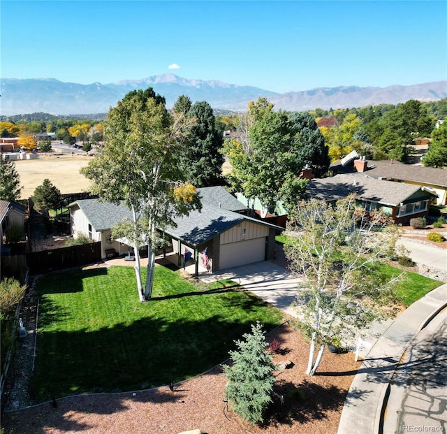 drone / aerial view featuring a mountain view