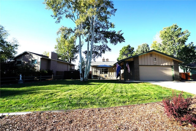 ranch-style house with a front yard and a garage