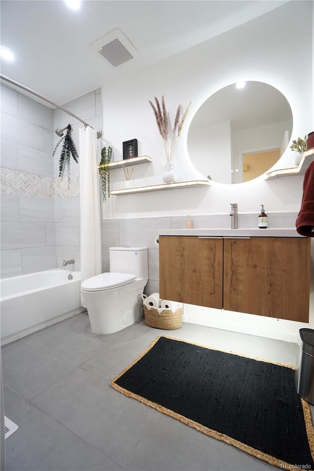 full bathroom with tile patterned flooring, vanity, toilet, and shower / bathtub combination with curtain