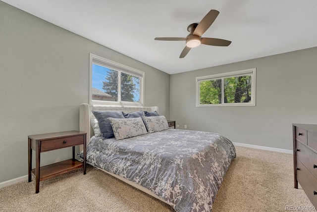 5071 S Boston St, Greenwood Village, CO 80111 - bedroom with light colored carpet, baseboards, and ceiling fan