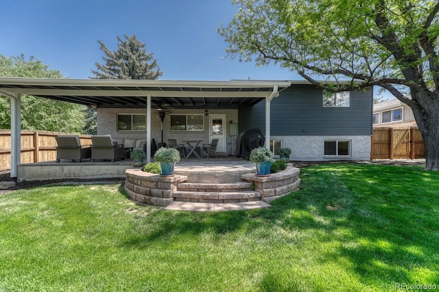 5071 S Boston St, Greenwood Village, CO 80111 - rear view of house featuring a patio, ceiling fan, and an outdoor hangout area