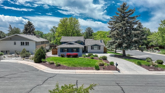 5071 S Boston St, Greenwood Village, CO 80111 - view of front facade featuring a front yard and concrete driveway