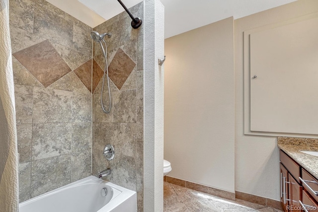 5071 S Boston St, Greenwood Village, CO 80111 - bathroom with shower / washtub combination, vanity, toilet, baseboards, and tile patterned flooring