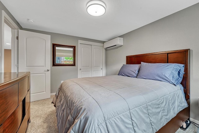 5071 S Boston St, Greenwood Village, CO 80111 - bedroom with a wall mounted AC, light colored carpet, baseboards, and a closet
