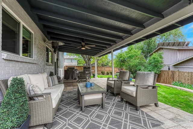 5071 S Boston St, Greenwood Village, CO 80111 - fenced backyard with outdoor lounge area, a patio, and ceiling fan