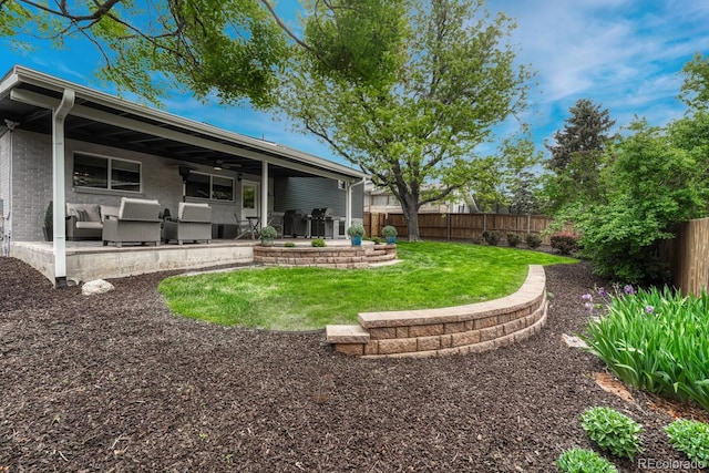 5071 S Boston St, Greenwood Village, CO 80111 - view of yard featuring outdoor lounge area, a ceiling fan, and a patio area