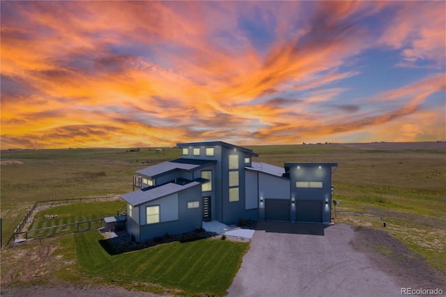 11680 Imboden Rd, Hudson, CO 80642 - contemporary home featuring a view of countryside, stucco siding, and driveway