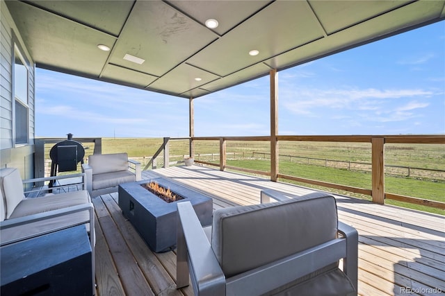 11680 Imboden Rd, Hudson, CO 80642 - deck featuring a rural view and an outdoor living space with a fire pit