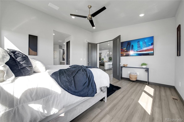11680 Imboden Rd, Hudson, CO 80642 - bedroom with light wood-type flooring, a ceiling fan, and recessed lighting