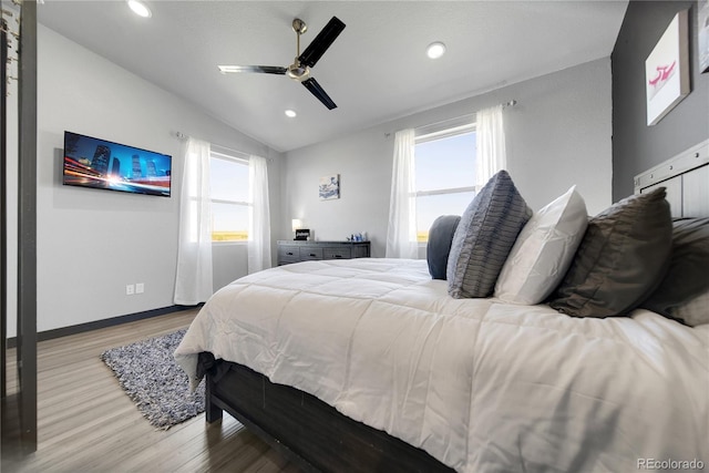 11680 Imboden Rd, Hudson, CO 80642 - bedroom with wood finished floors, multiple windows, lofted ceiling, recessed lighting, and a ceiling fan