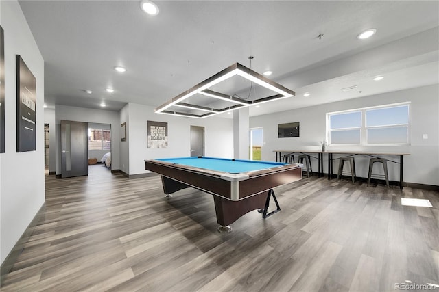 11680 Imboden Rd, Hudson, CO 80642 - rec room with wood finished floors, recessed lighting, billiards table, and healthy amount of natural light